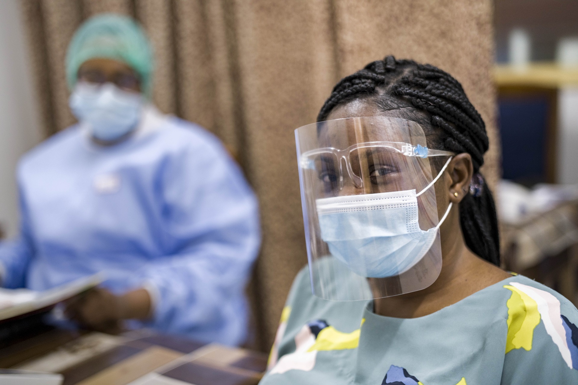 Wearing PPE to protect patients and medical staff from COVID-19